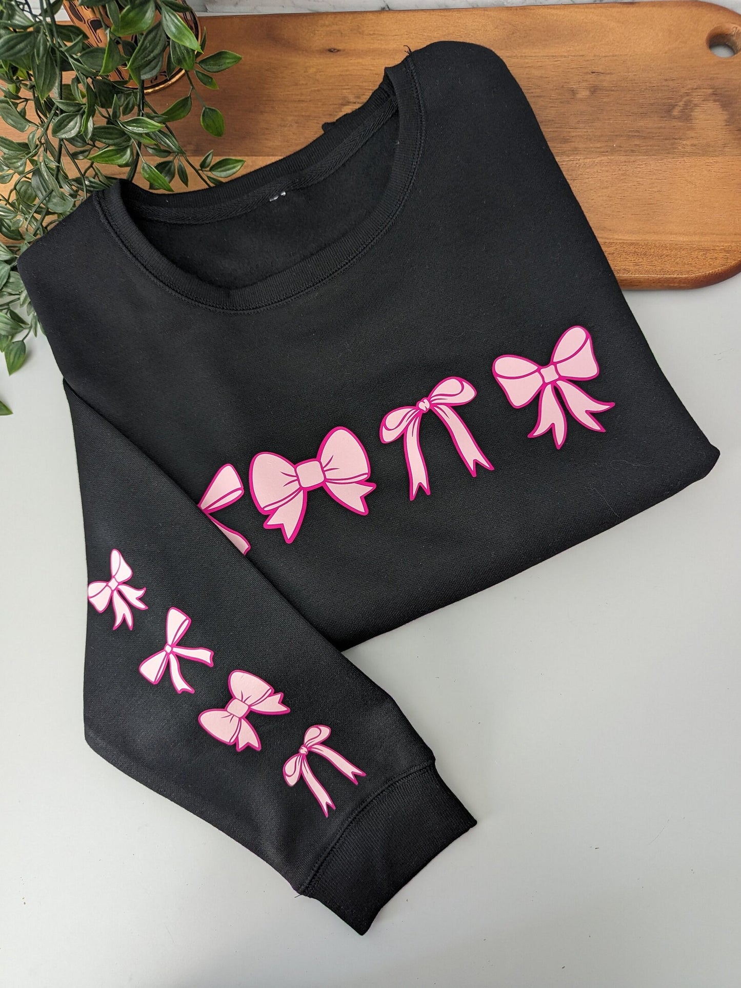 Pretty pink Bows women's crewneck jumper